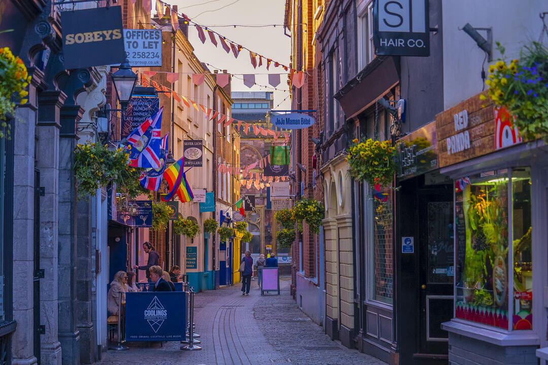 A view down a shopping street in a city