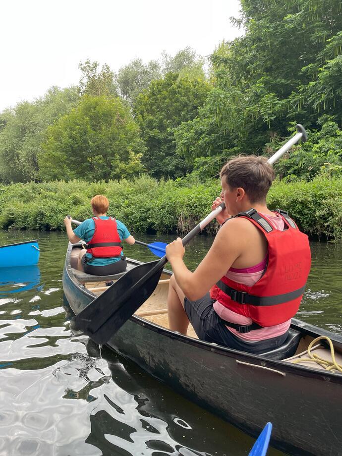 Two people canoeing