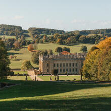 Exterior view of country house and gardens in autumn