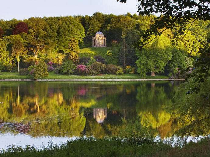 The Temple of Apollo reflected in the lake at Stourhead, Wiltshire