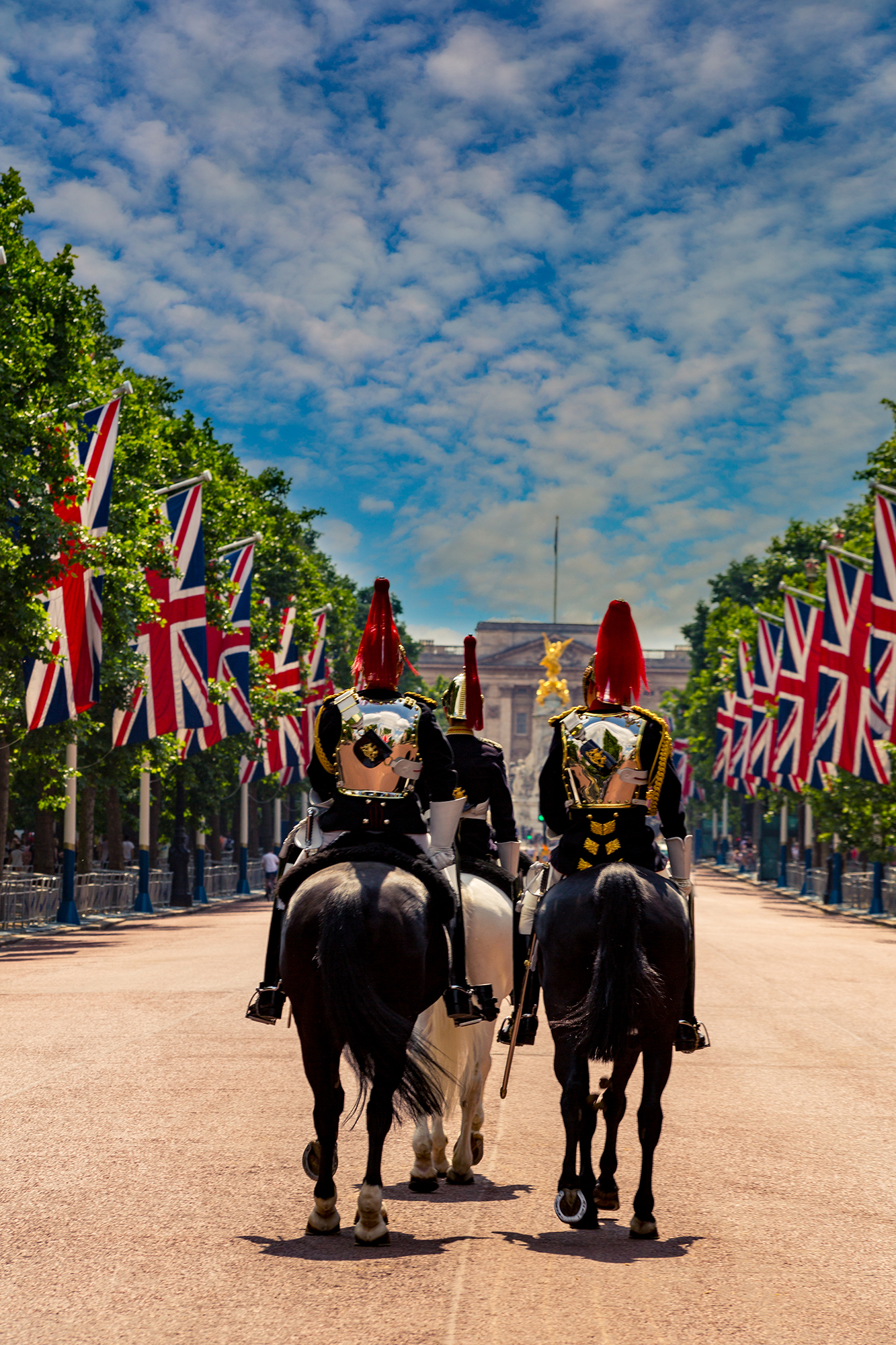 Military Guards on horses between rows of Union jack flags