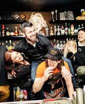 A group of people behind the bar at Cardiff's Lab 22 bar