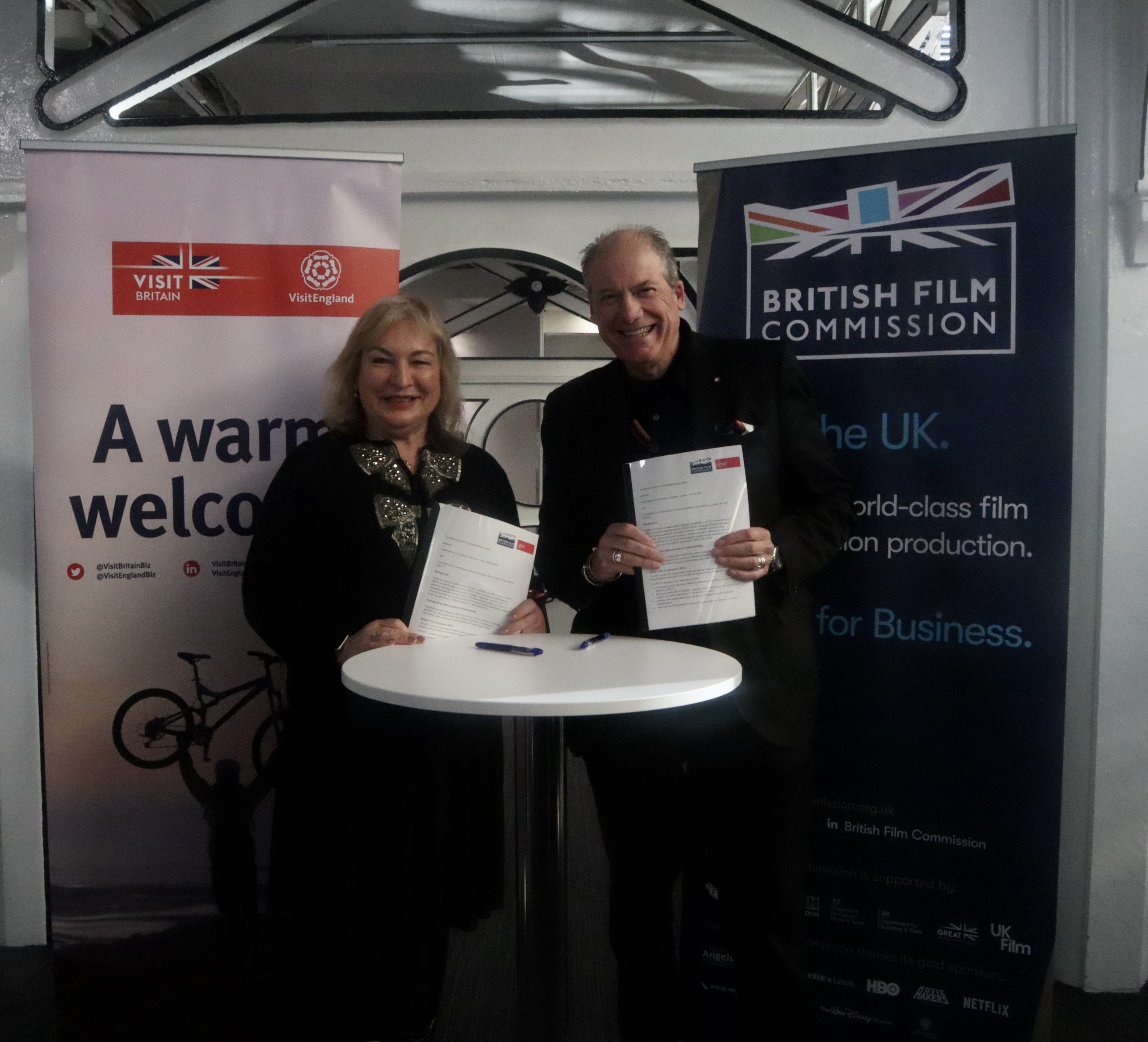 VisitBritain CEO Patricia Yates and Adrian Wootton OBE, Chief Executive of the British Film Commission sign a Memorandum of Understanding at FOCUS London