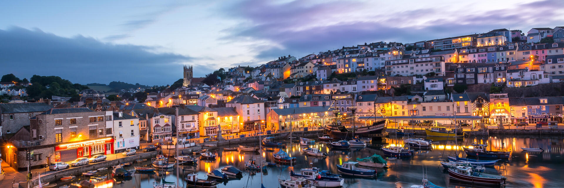 A beautiful evening dusk view over a quaint English village and harbour