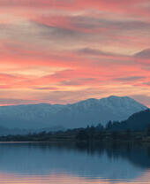 The sun sets behind Ben Venue at the Western End of Loch Venachar