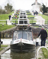 A barge sailing through Foxton Locks in Leicestershire