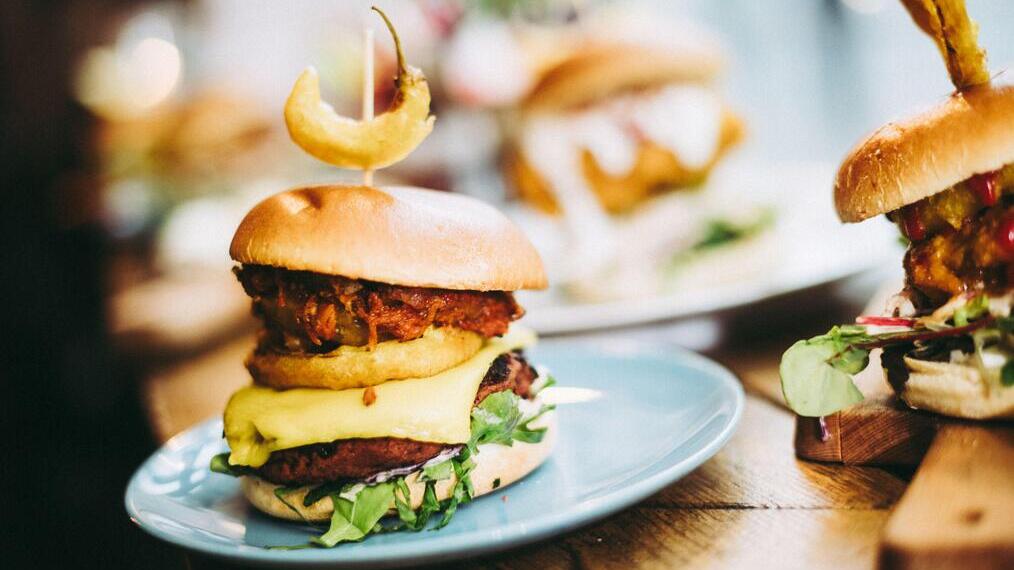Closeup shot of vegan burgers on a table in a restaurant
