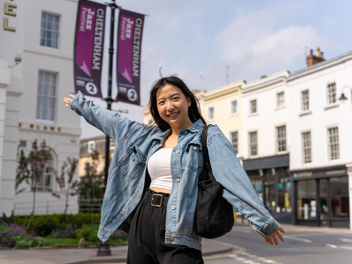 Woman posing in a city street