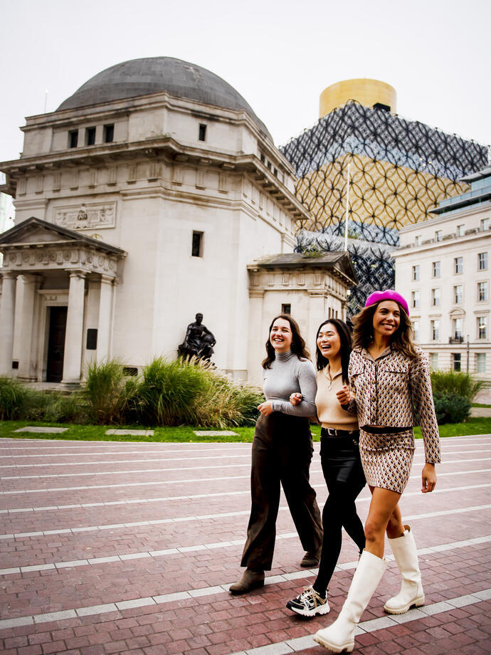 Friends smiling and enjoying a walk in Jewellery Quarter
