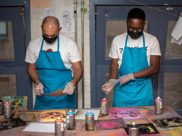 A group of people on a graffiti workshop at Graft in Bristol