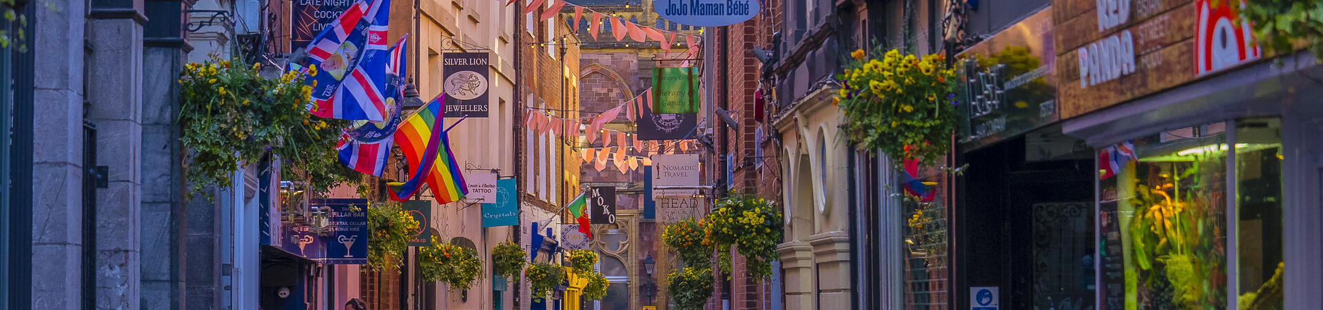A view down a shopping street in a city