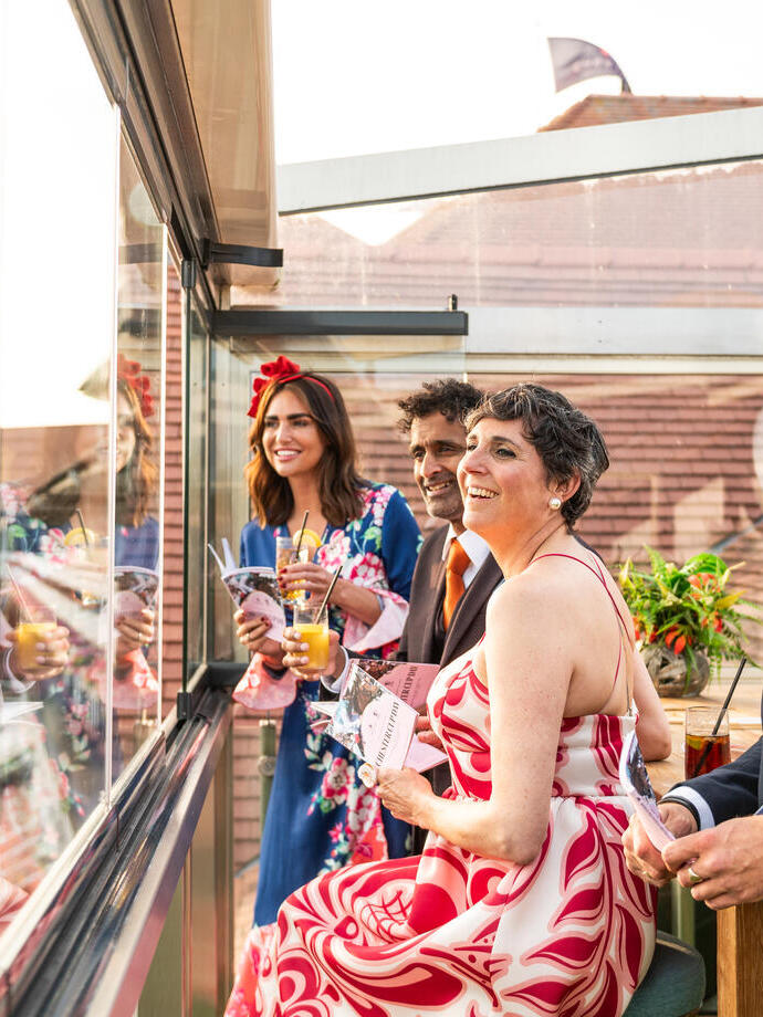 A group of friends at a race course