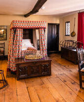 A replica of a historic bedroom at Stranger's Hall in Norwich