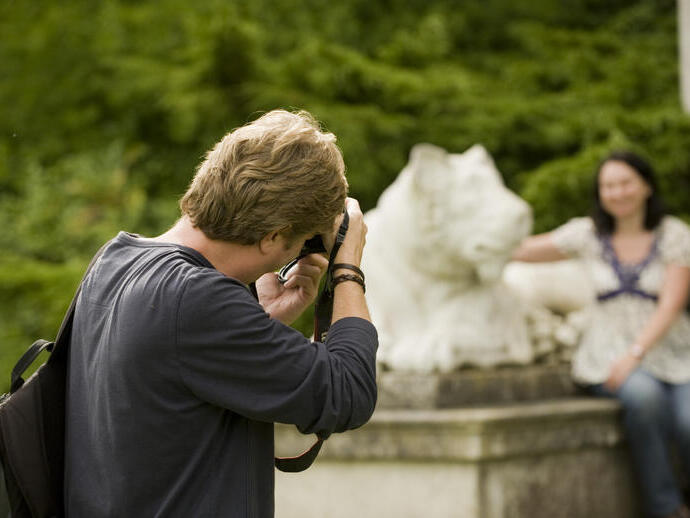 Visitors taking photographs at West Wycombe Park, Buckinghamshire
