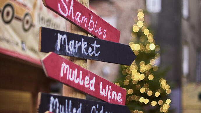 Signage at Christmas market written in chalk
