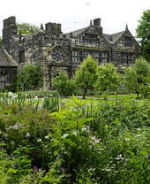 An English manor house and formal gardens