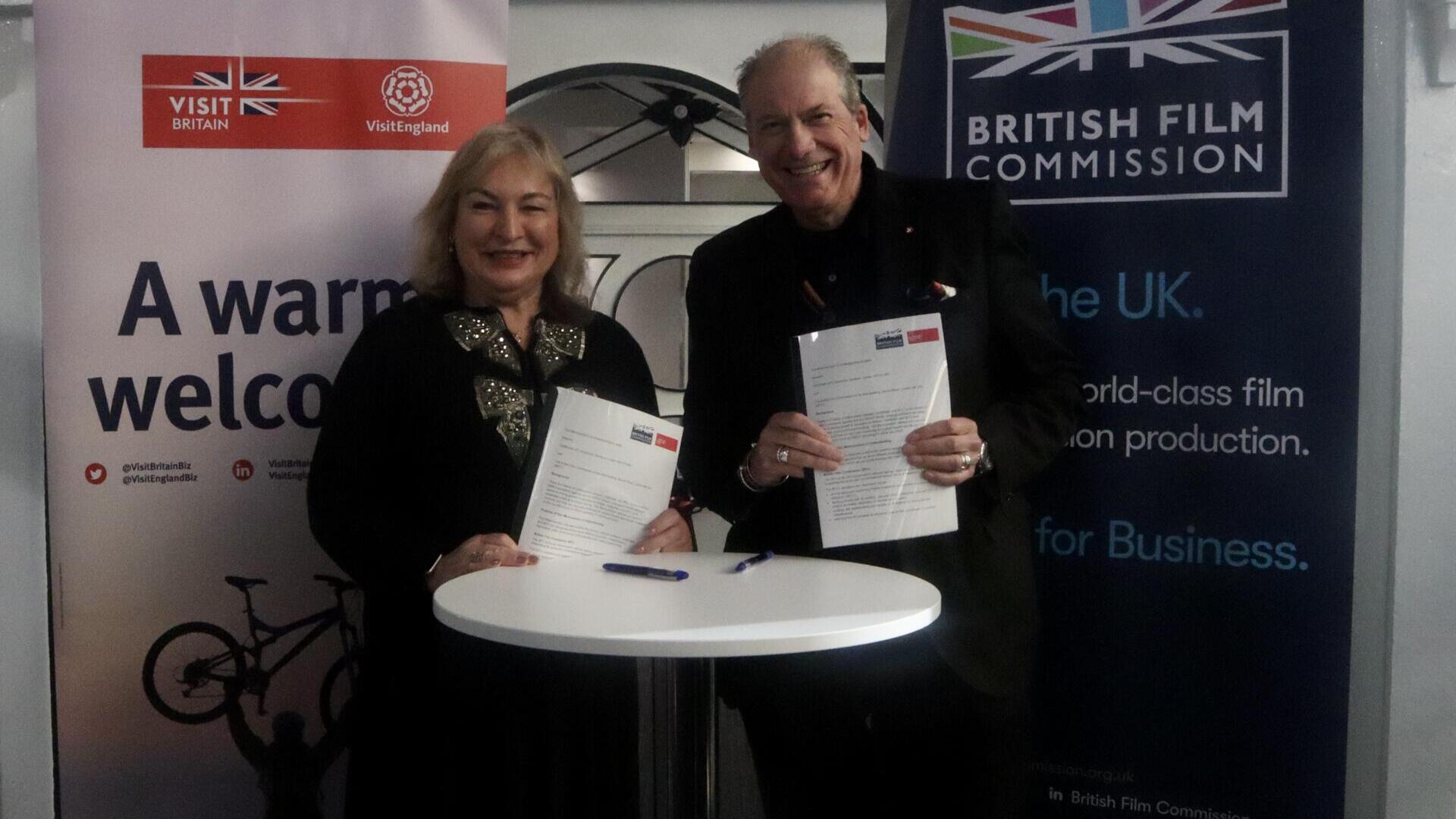 VisitBritain CEO Patricia Yates and Adrian Wootton OBE, Chief Executive of the British Film Commission sign a Memorandum of Understanding at FOCUS London