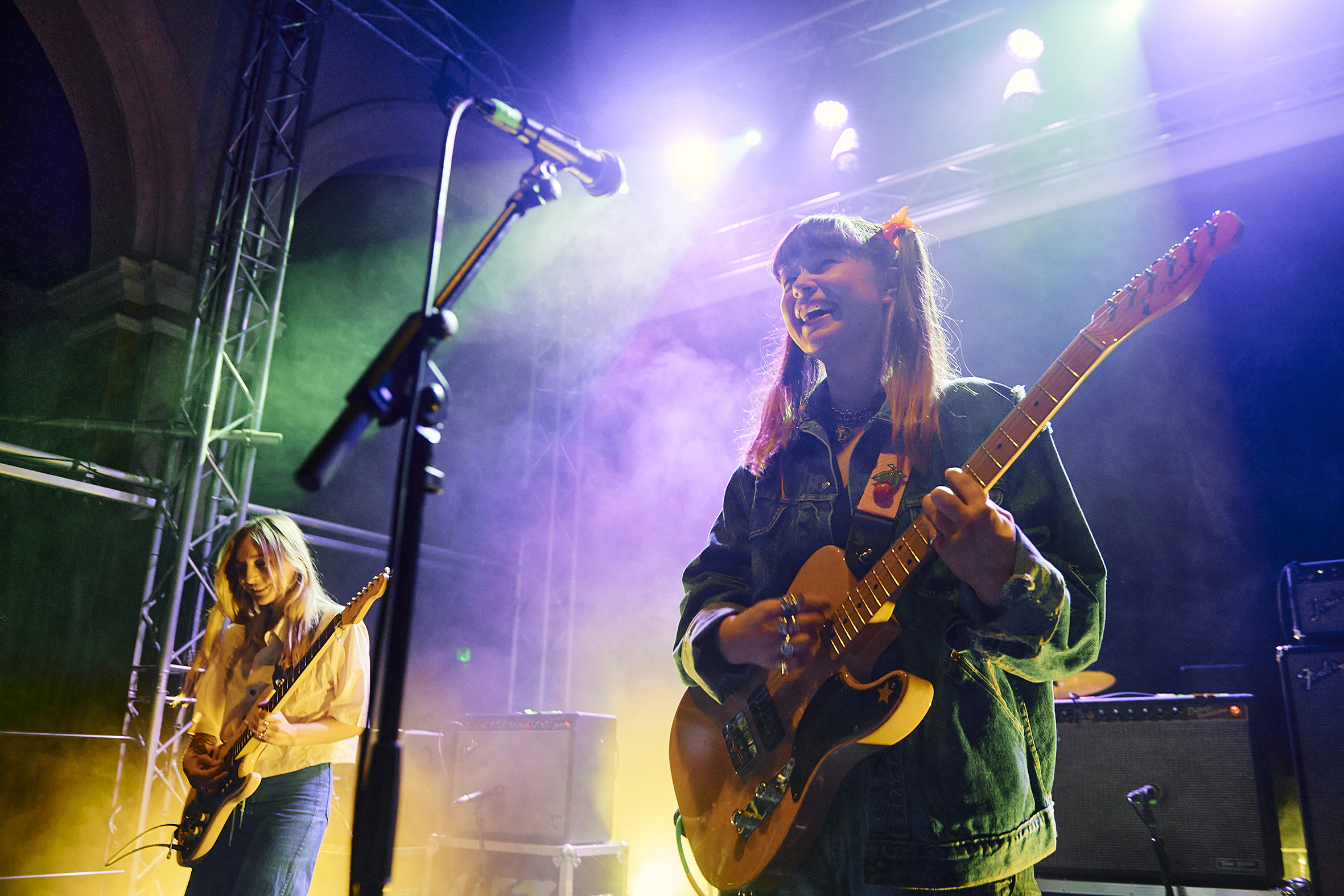Lady singing and playing guitar at Norwich Arts Centre