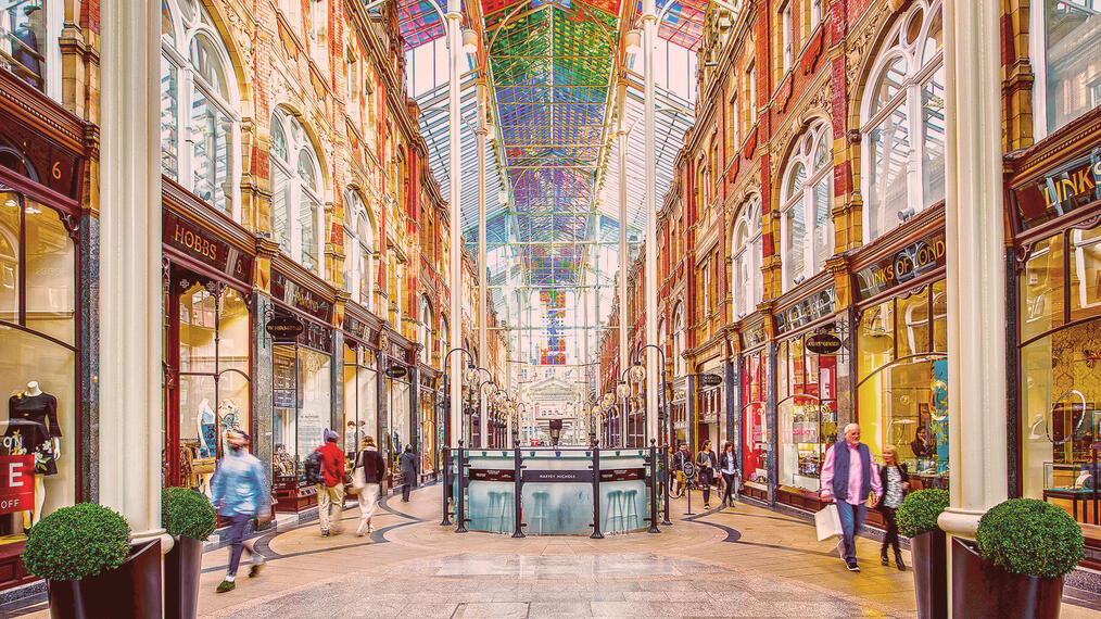 A view down a shopping street in Leeds' historic Victoria Quarter