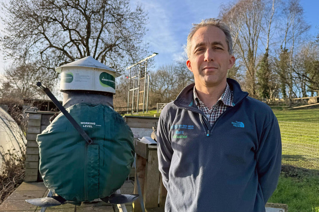 Man standing in an outdoor activity centre