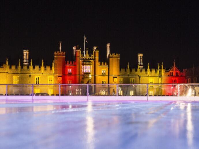 An ice rink set within the grounds of Hampton Court Palace in London.