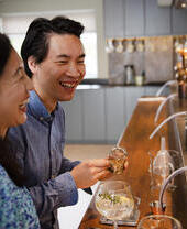 Couple on a gin tasting experience at a distillery
