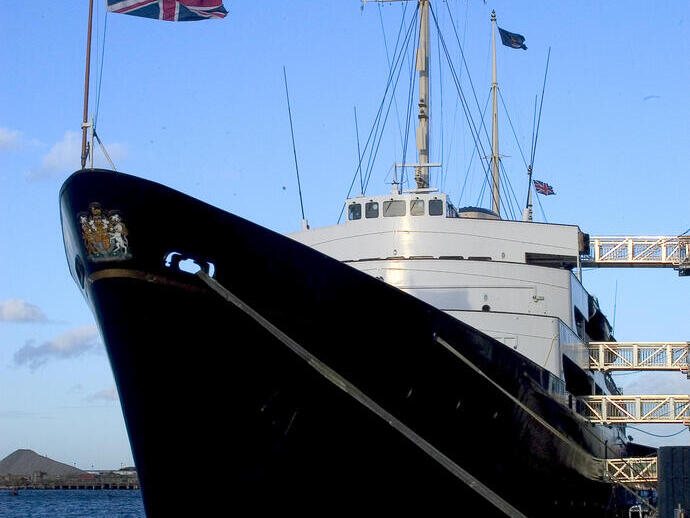 Exterior of a royal yacht with a British flag
