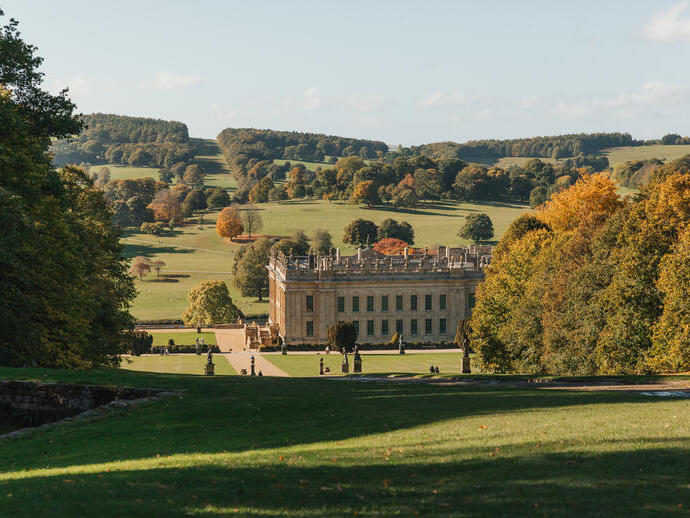 Exterior view of country house and gardens in autumn