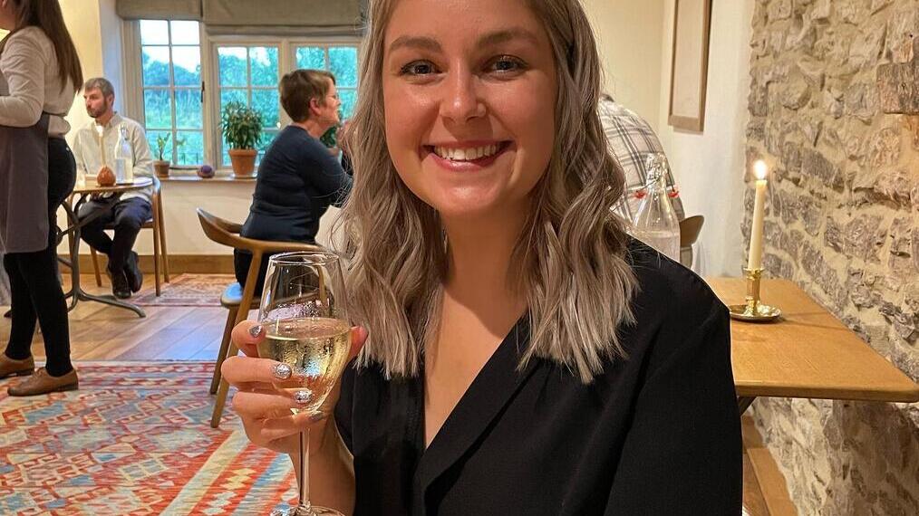 Woman holding a glass of wine