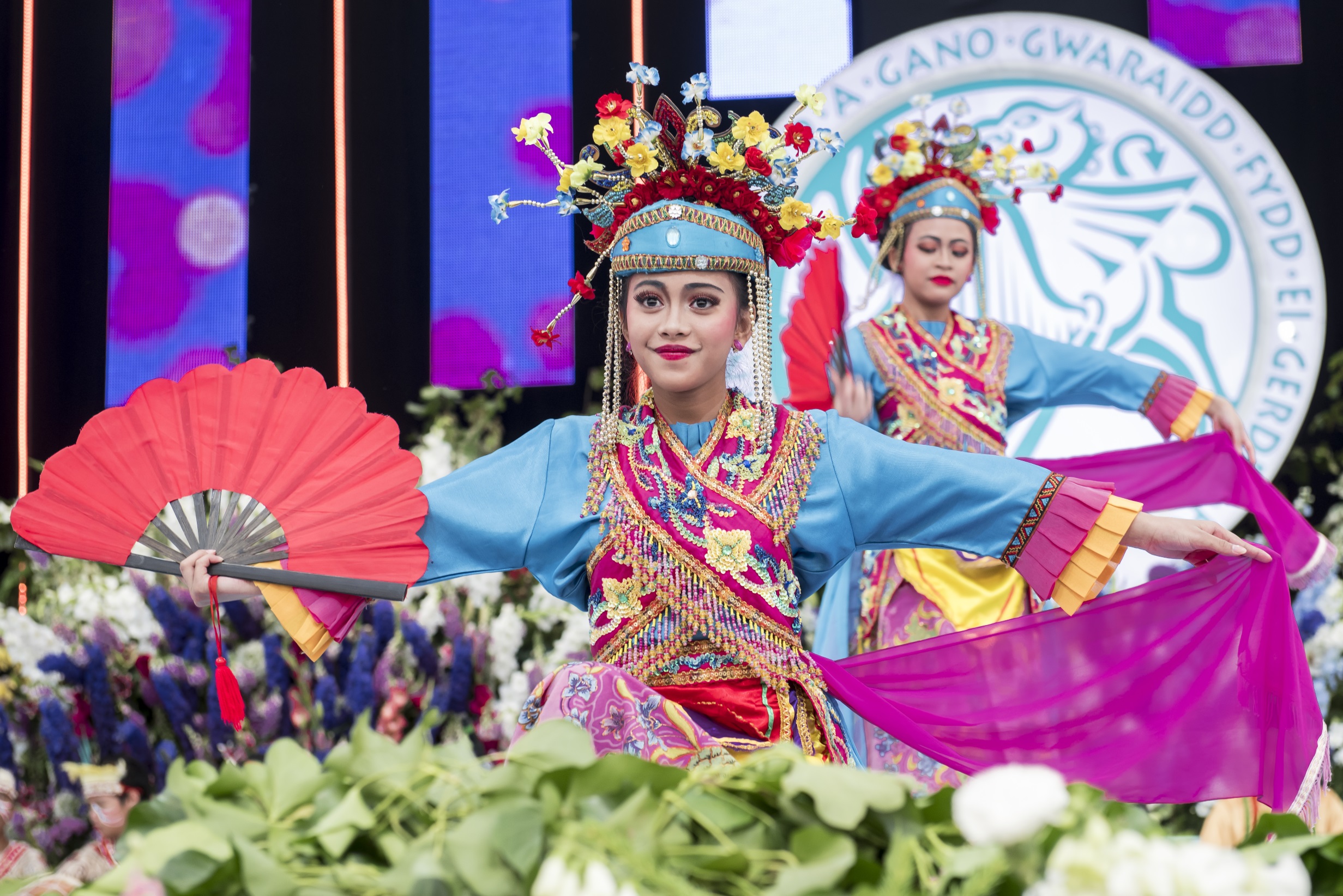 A group of performers on stage as part of Llangollen International Musical Eisteddfod