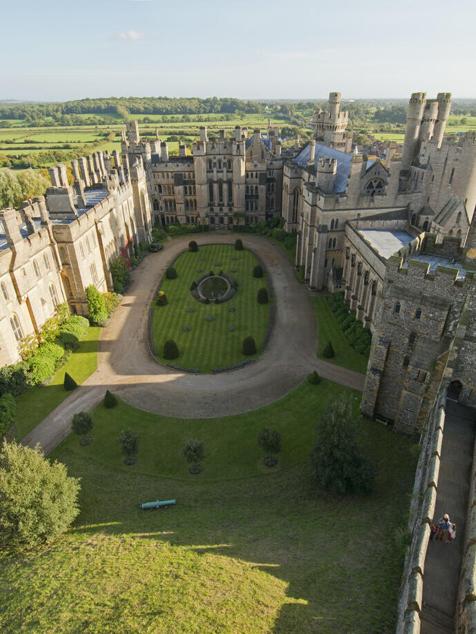 Aerial view of a castle and the countryside beyond
