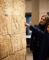 Winter- an evening at the Ashmolean museum, lady and girl looking at an exhibit