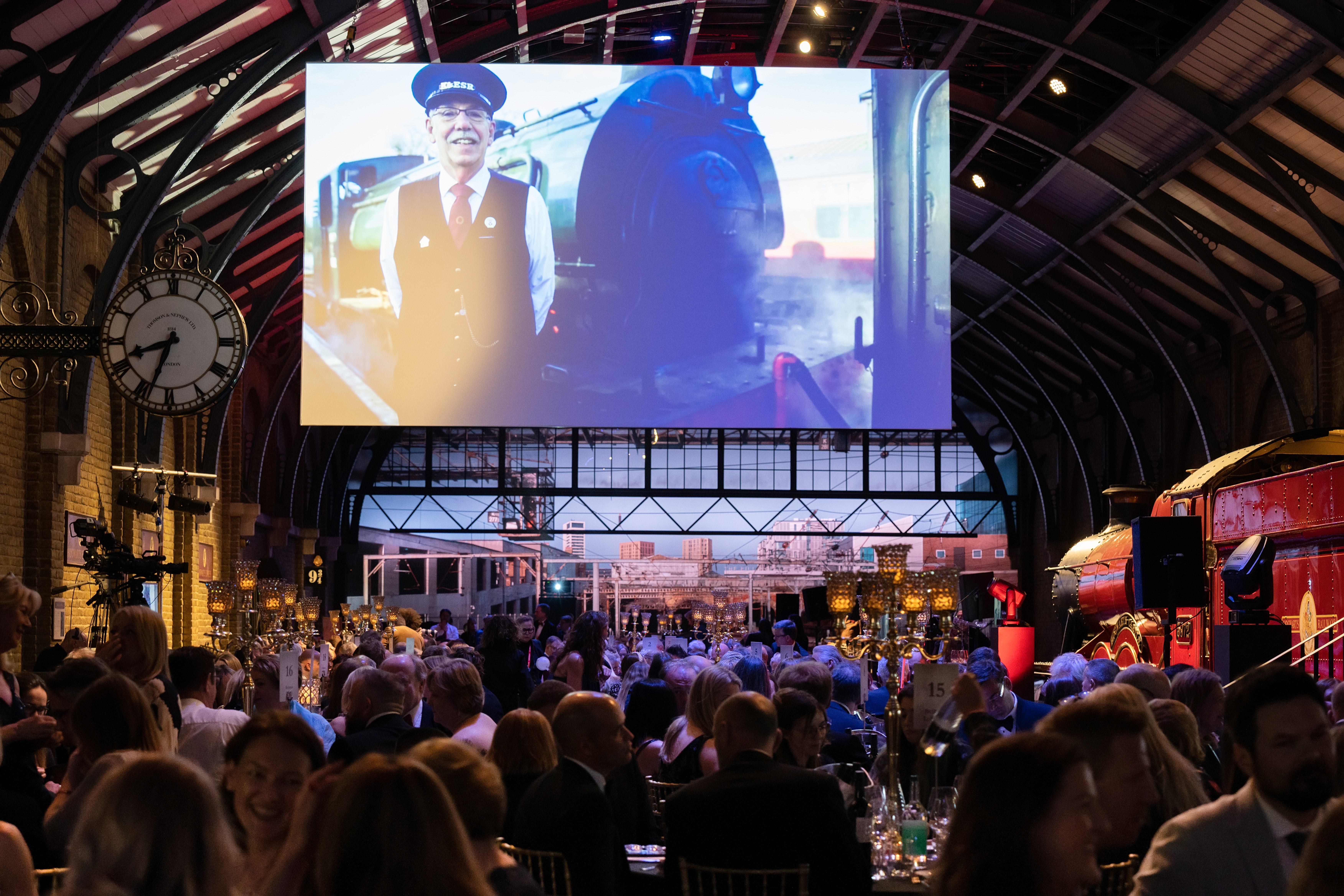 Photo of the Platform 9 ¾ set up with guests at the VisitEngland Awards for Excellence 2023. Warner Bros. Studio Tour - The Making of Harry Potter, Hertfordshire.