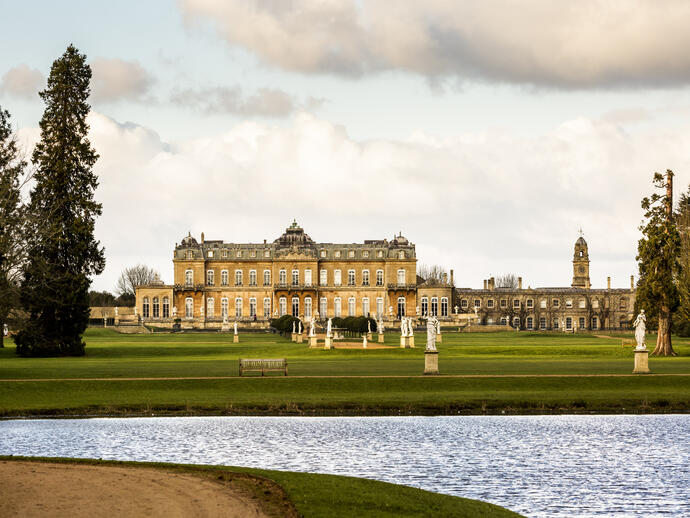 A formal Country Estate, and its lake and formal gardens and manicured lawns