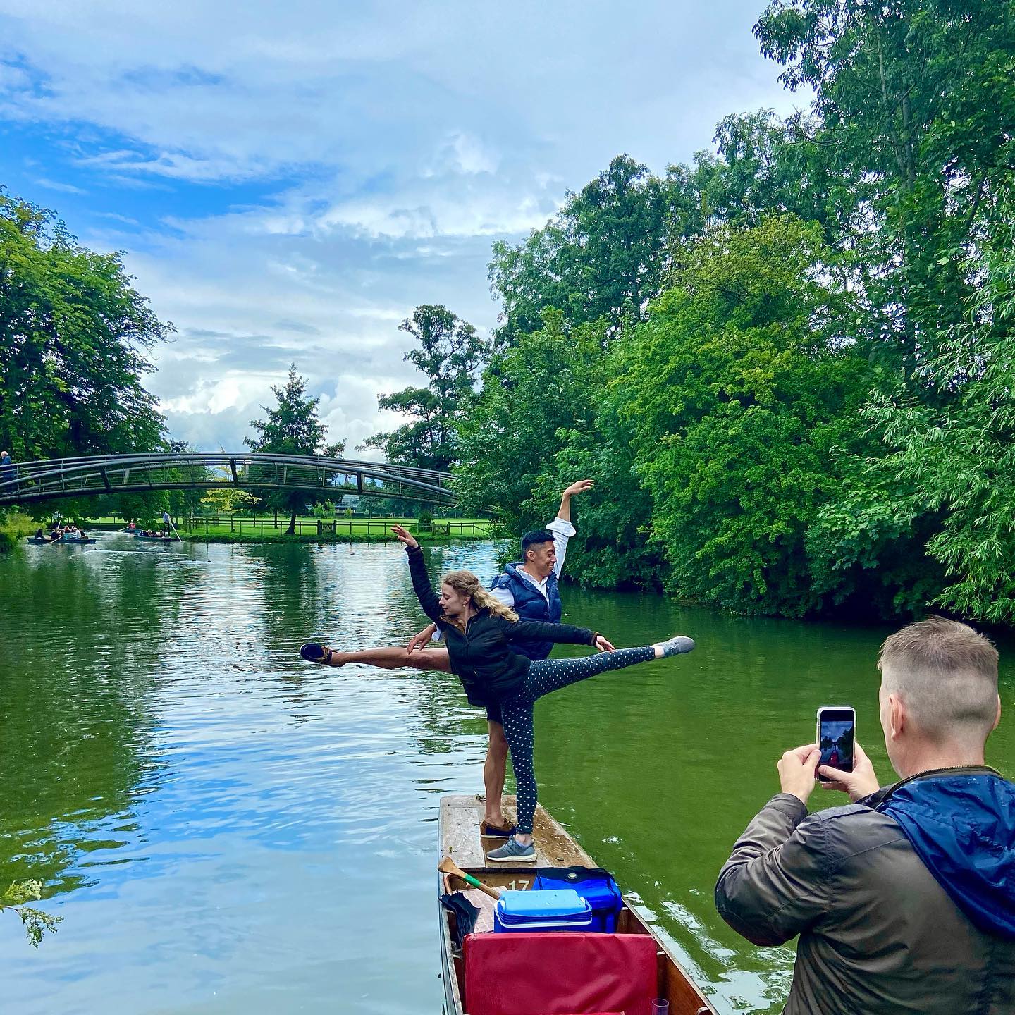 Group of people posing on a punting boat, Oxford