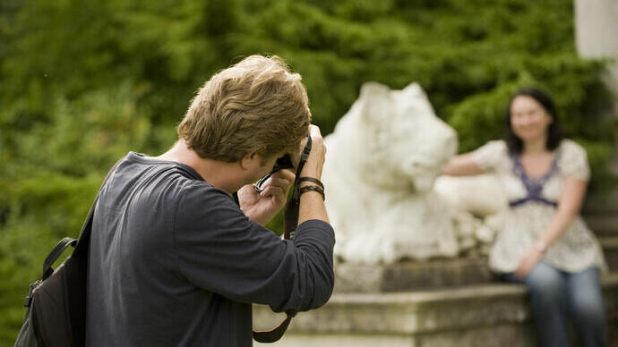Visitors taking photographs at West Wycombe Park, Buckinghamshire