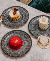 Plates of food being served on a table at Fourth Floor Bar in Harvey Nichols Leeds