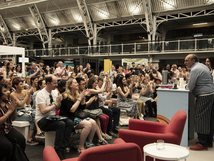 People clapping during the Traveller Food Festival show