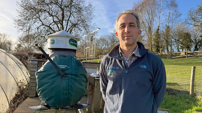 Man standing in an outdoor activity centre