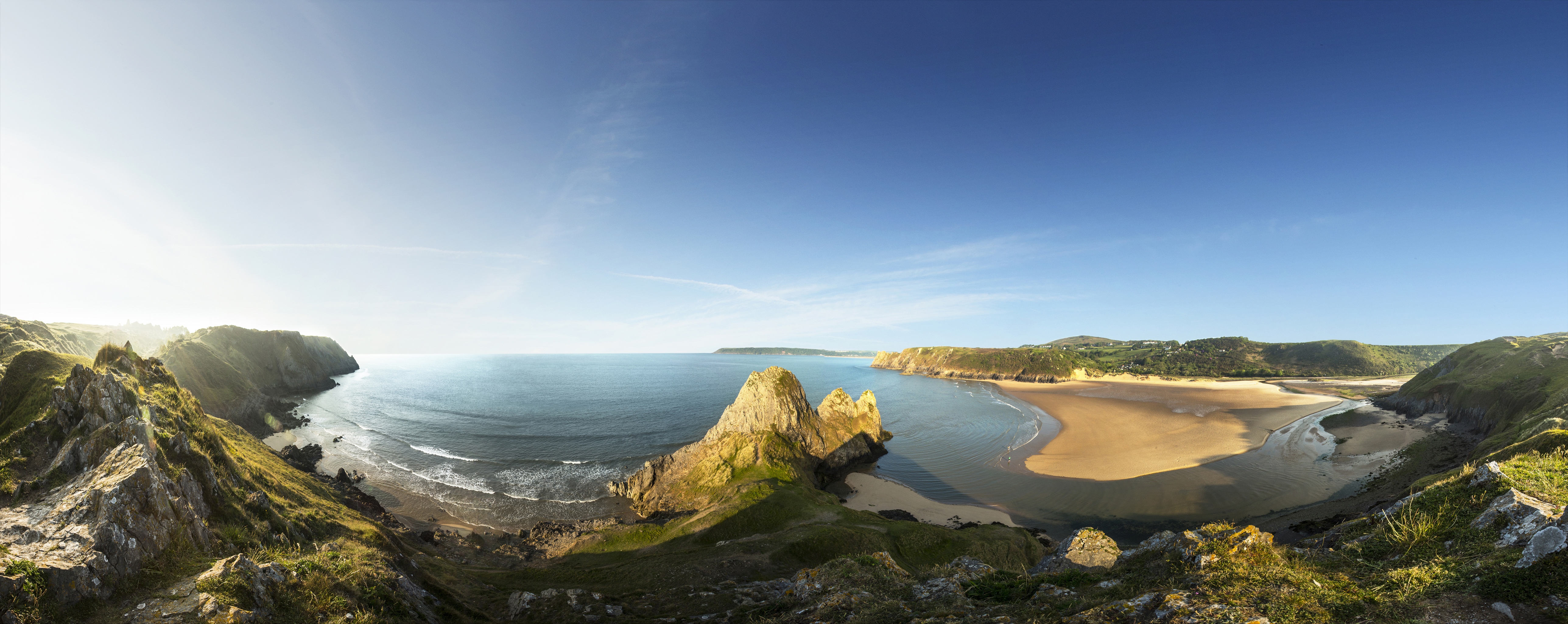 Panoramic view over the coastline and a sandy beach