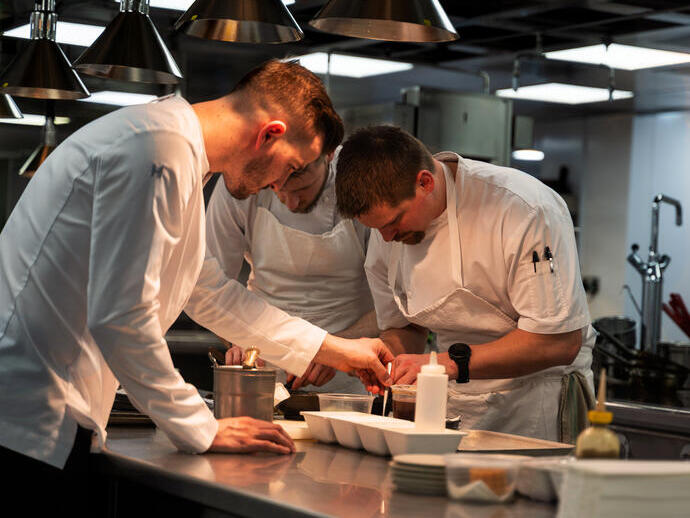 Chefs working in the restaurant kitchen at Whatley Manor, Malmesbury