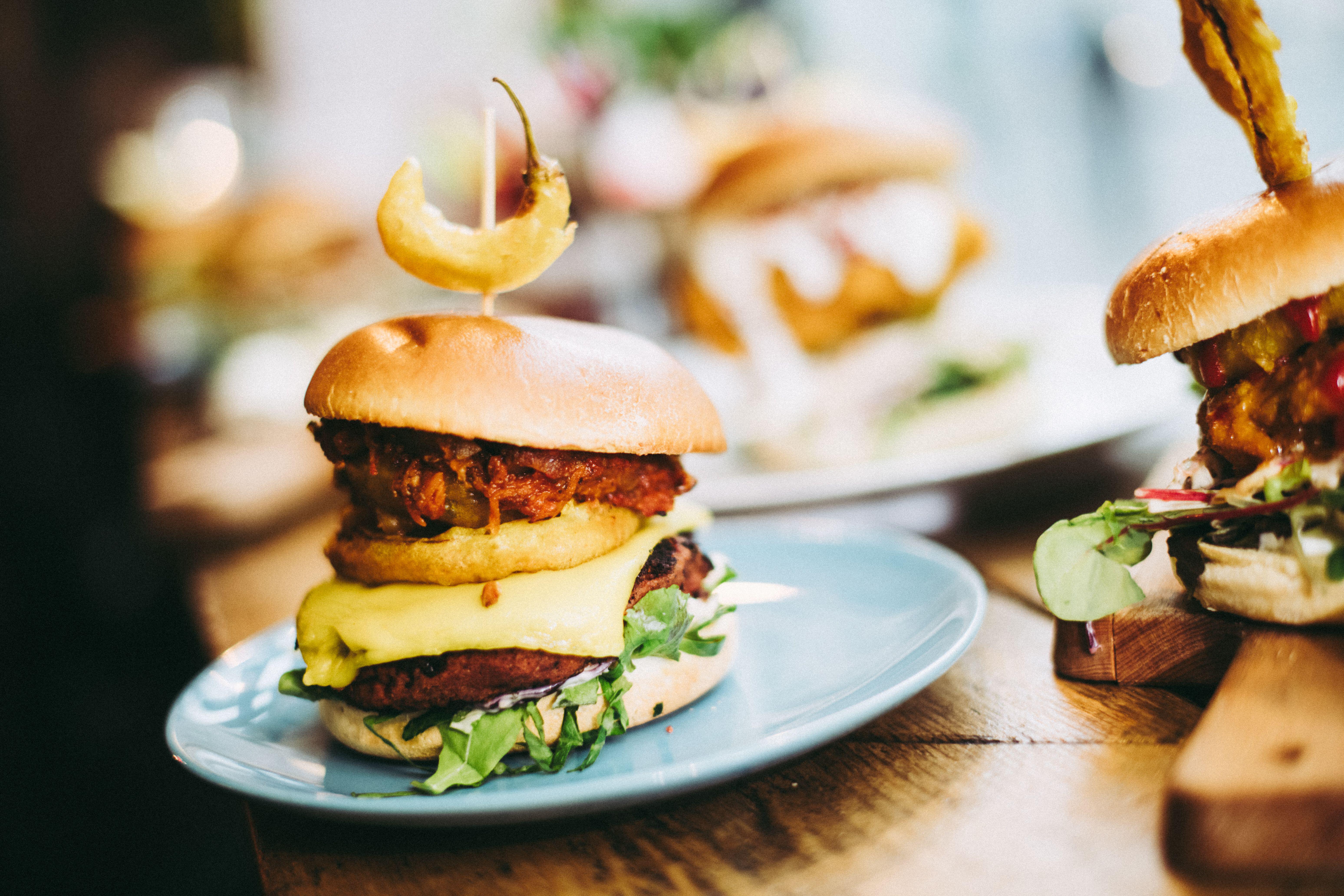 Closeup shot of vegan burgers on a table in a restaurant