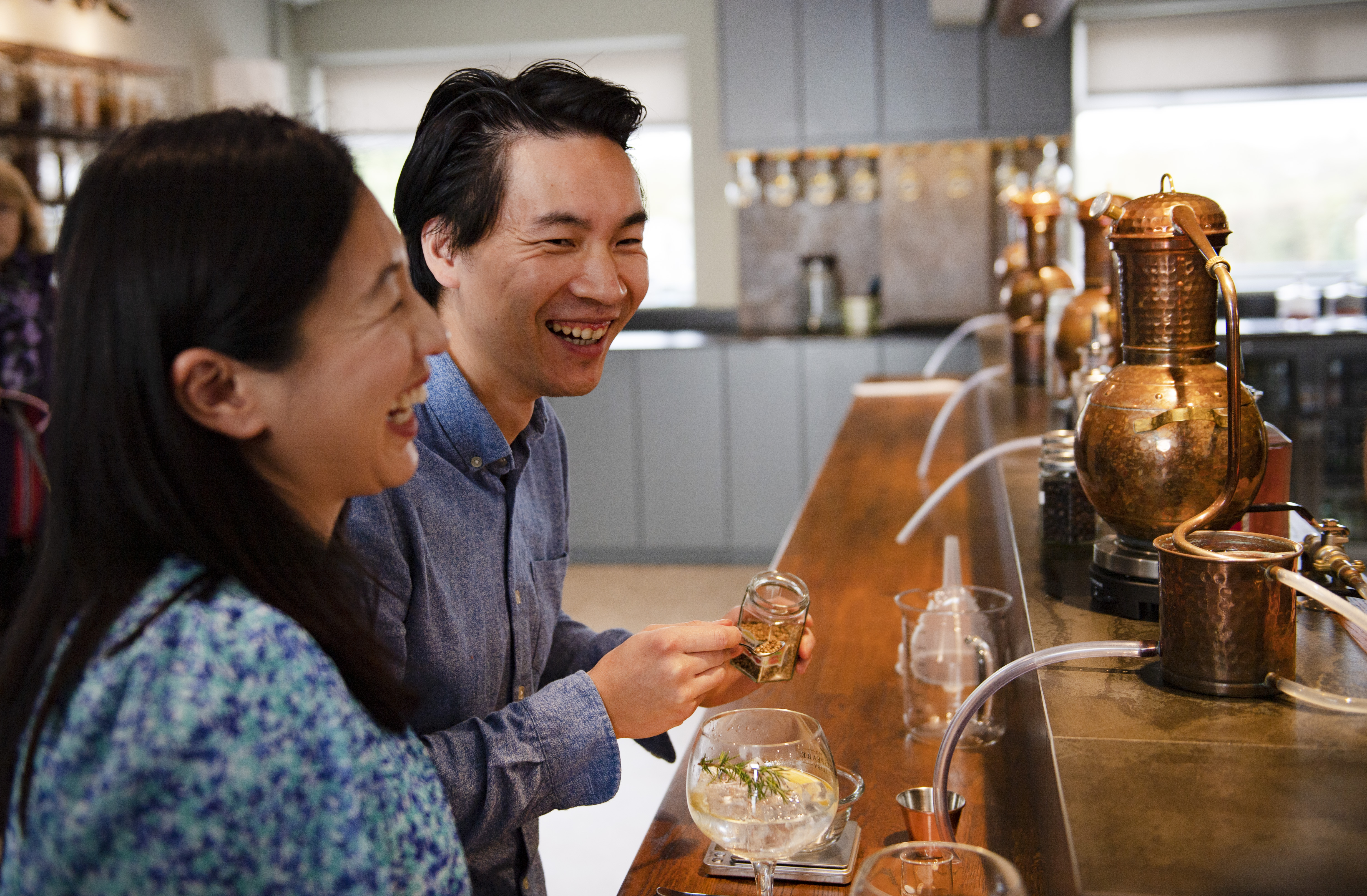 Couple on a gin tasting experience at a distillery