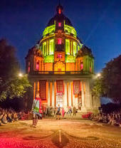 A performance onstage outdoors at The Dukes Theatre in Williamson Park, Lancashire