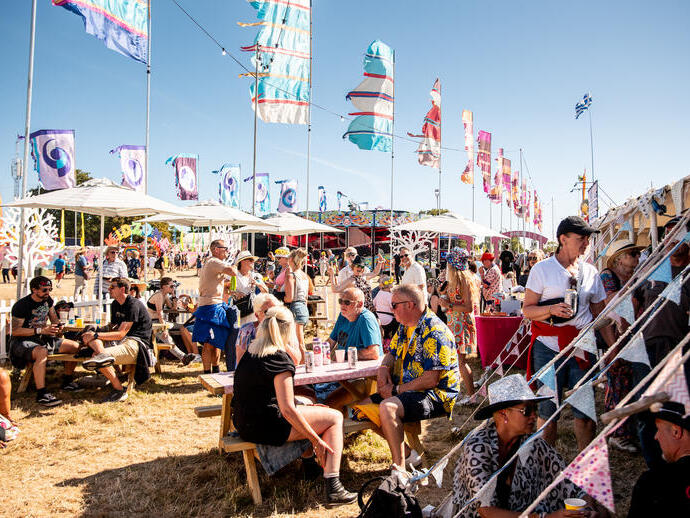 People enjoying a summer music festival