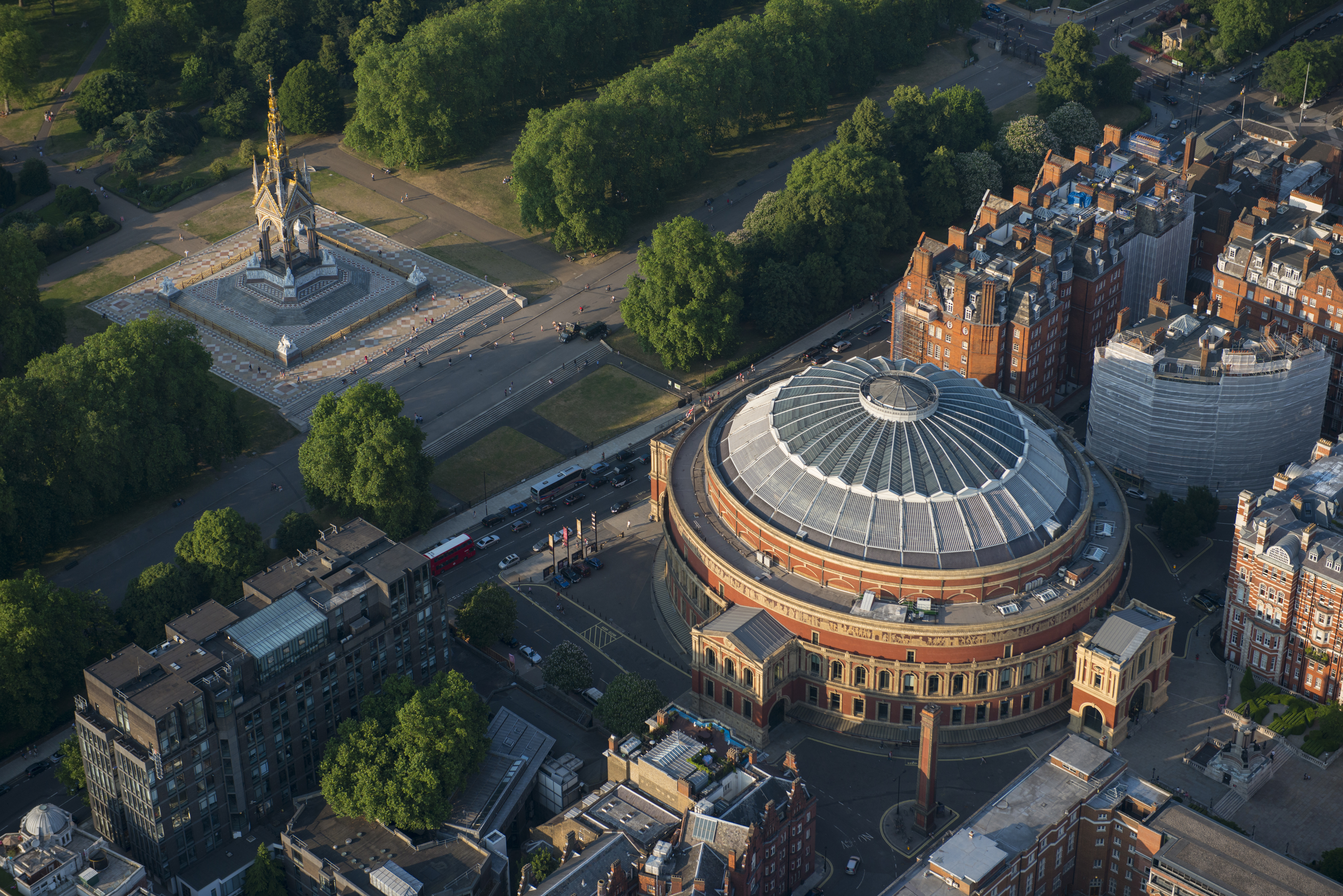 Aerial view of a concert hall and memorial in a park in a city