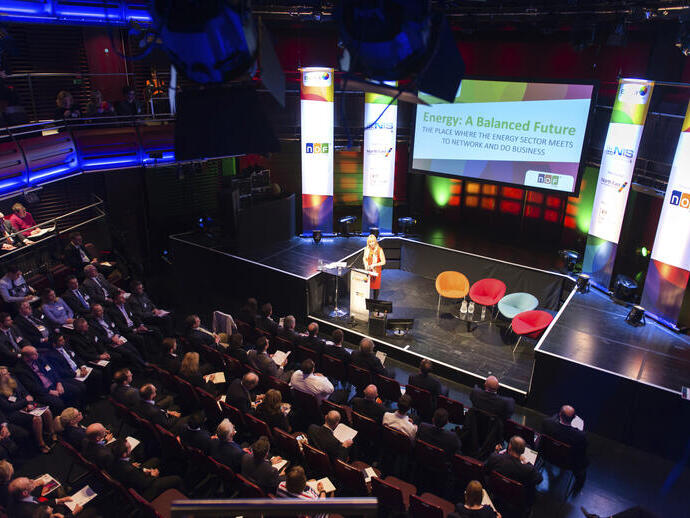 A speaker on stage at the NOF Energy National Conference and Exhibition