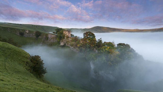 Castle on a beautiful misty morning in Autumn