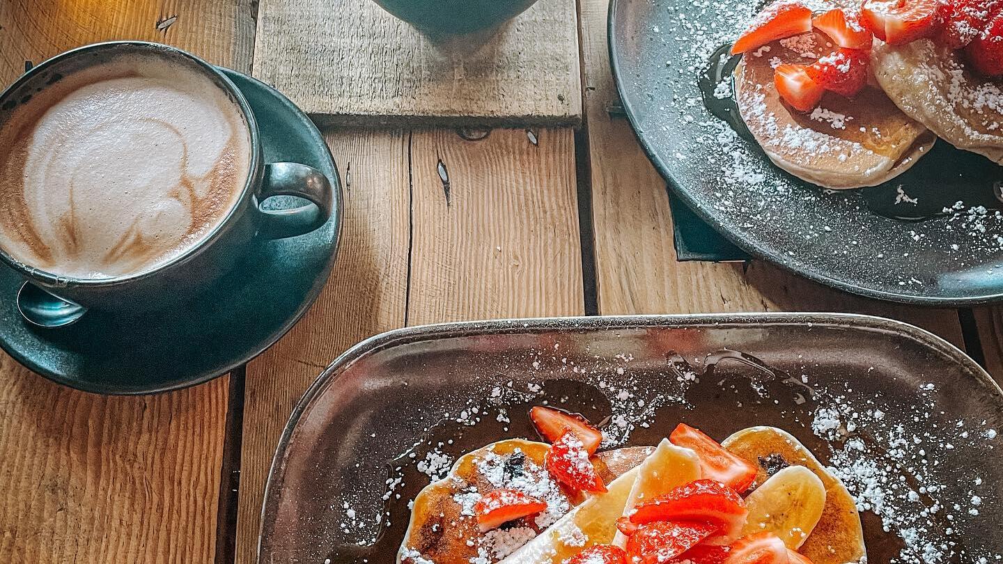 Plates of food on a table at the Green Shed Cafe
