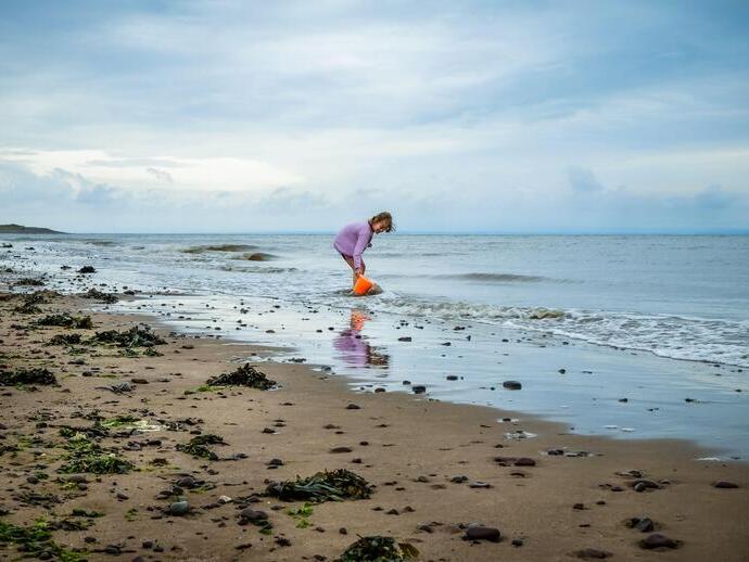 Child on the beach playing